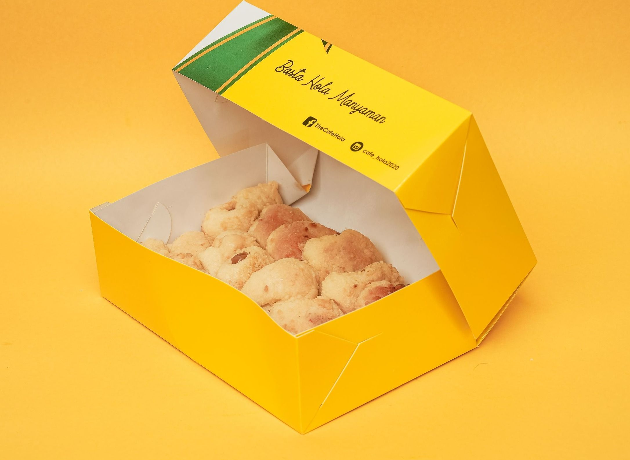 Hola Yema Cheese Bread Bites — golden pillowy bite-sized bread bites in an open yellow Hola box