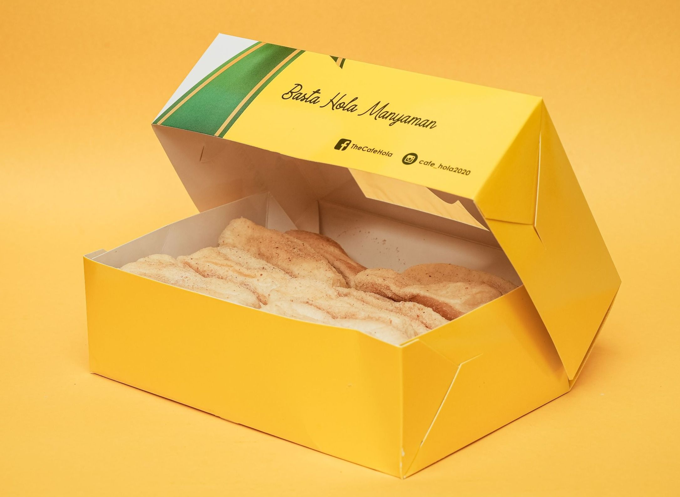 Hola Spanish Bread — soft cinnamon-dusted Spanish bread rolls packed in an open yellow Hola box